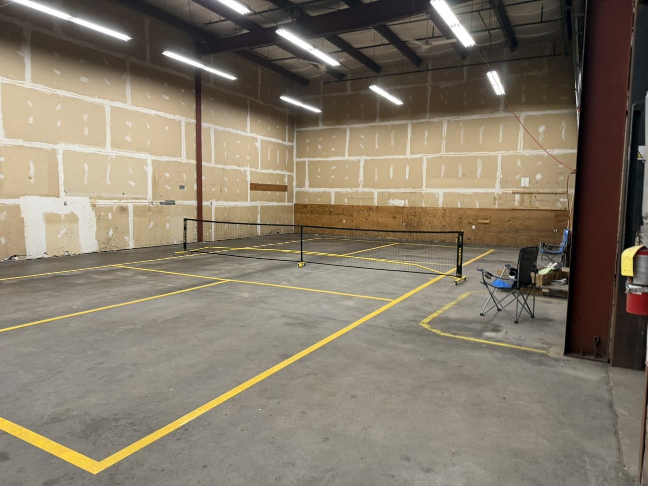 The tall rear space, big enough for active play and courts